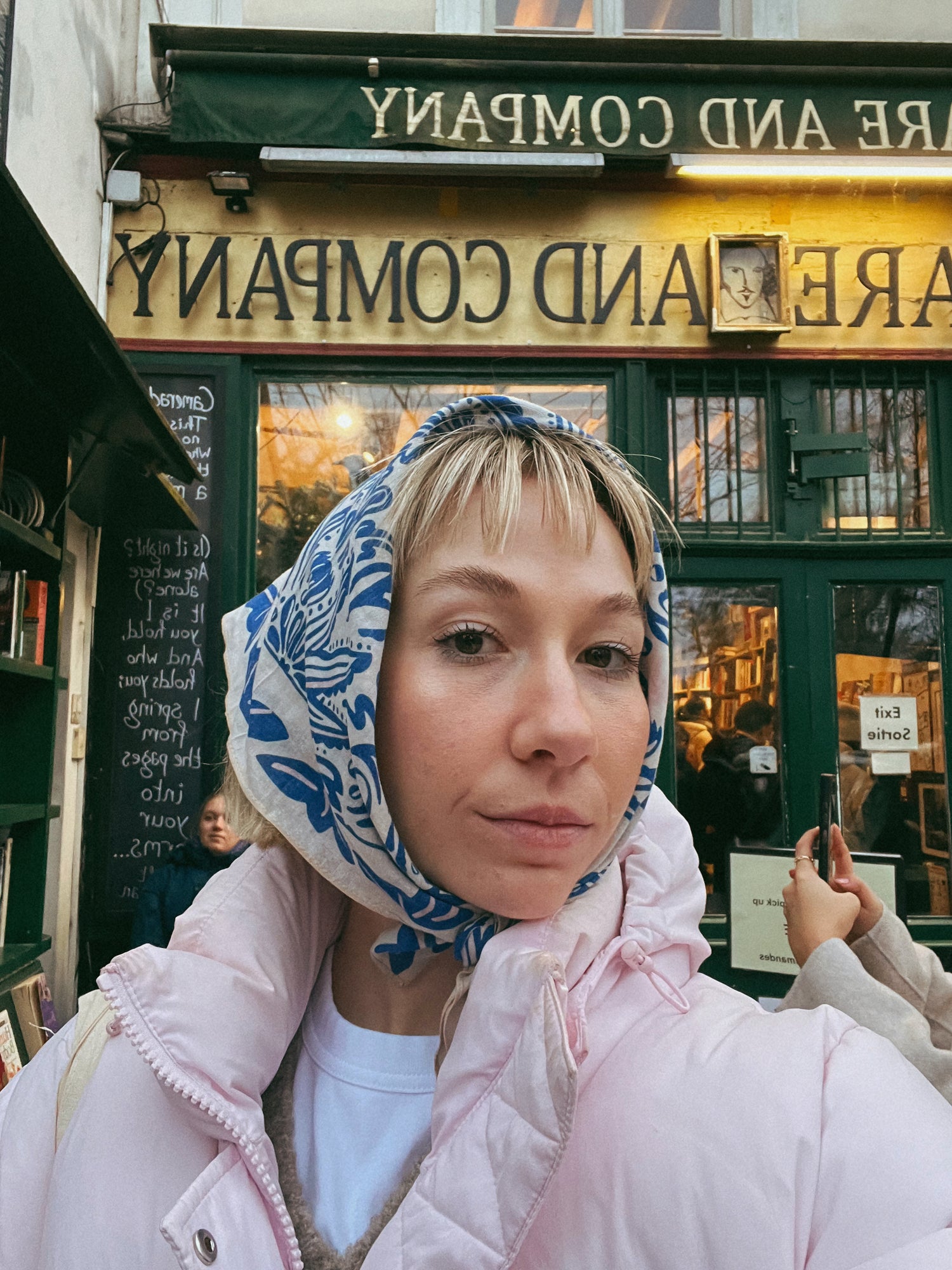 Girl with bandana (head scarf) wrapped around her head in paris