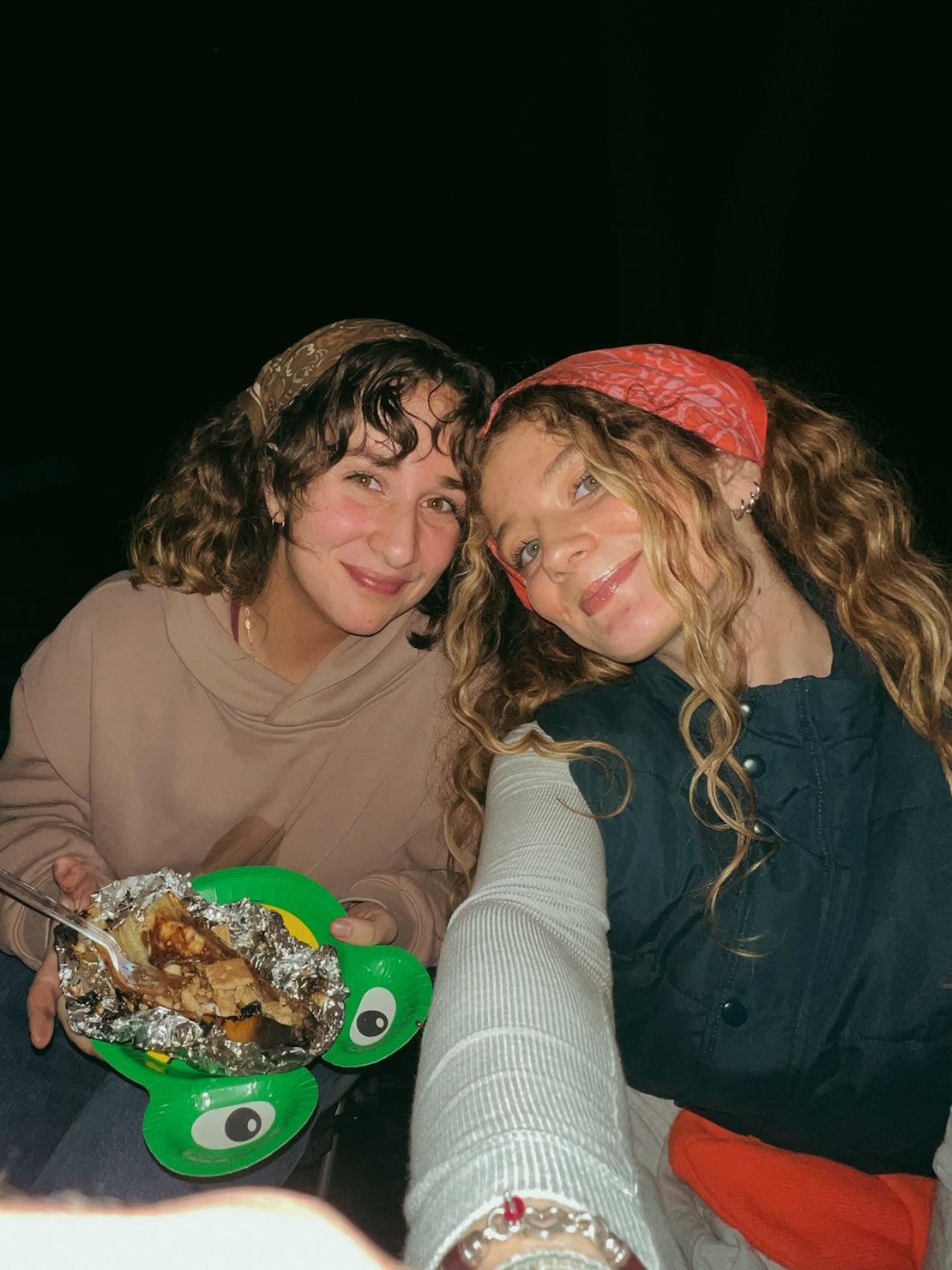 two bandanas styled at a bonfire